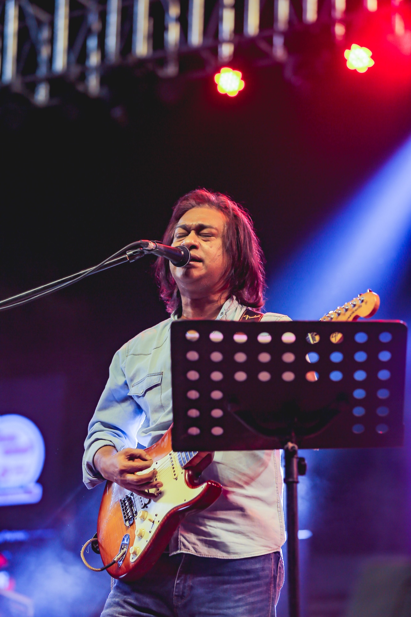 Musician performing at a Bangla rock concert in Dhaka — Sayeed BM