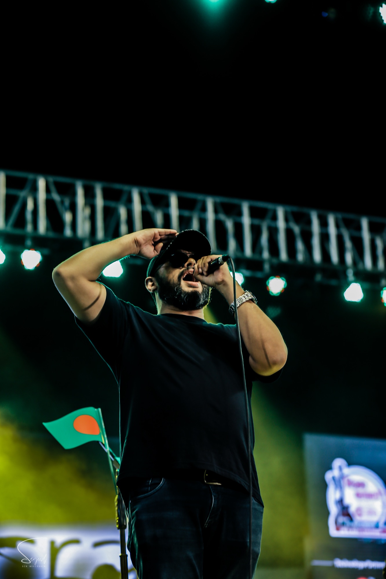 Performer on stage at a live Bangla rock concert in Dhaka — Sayeed BM