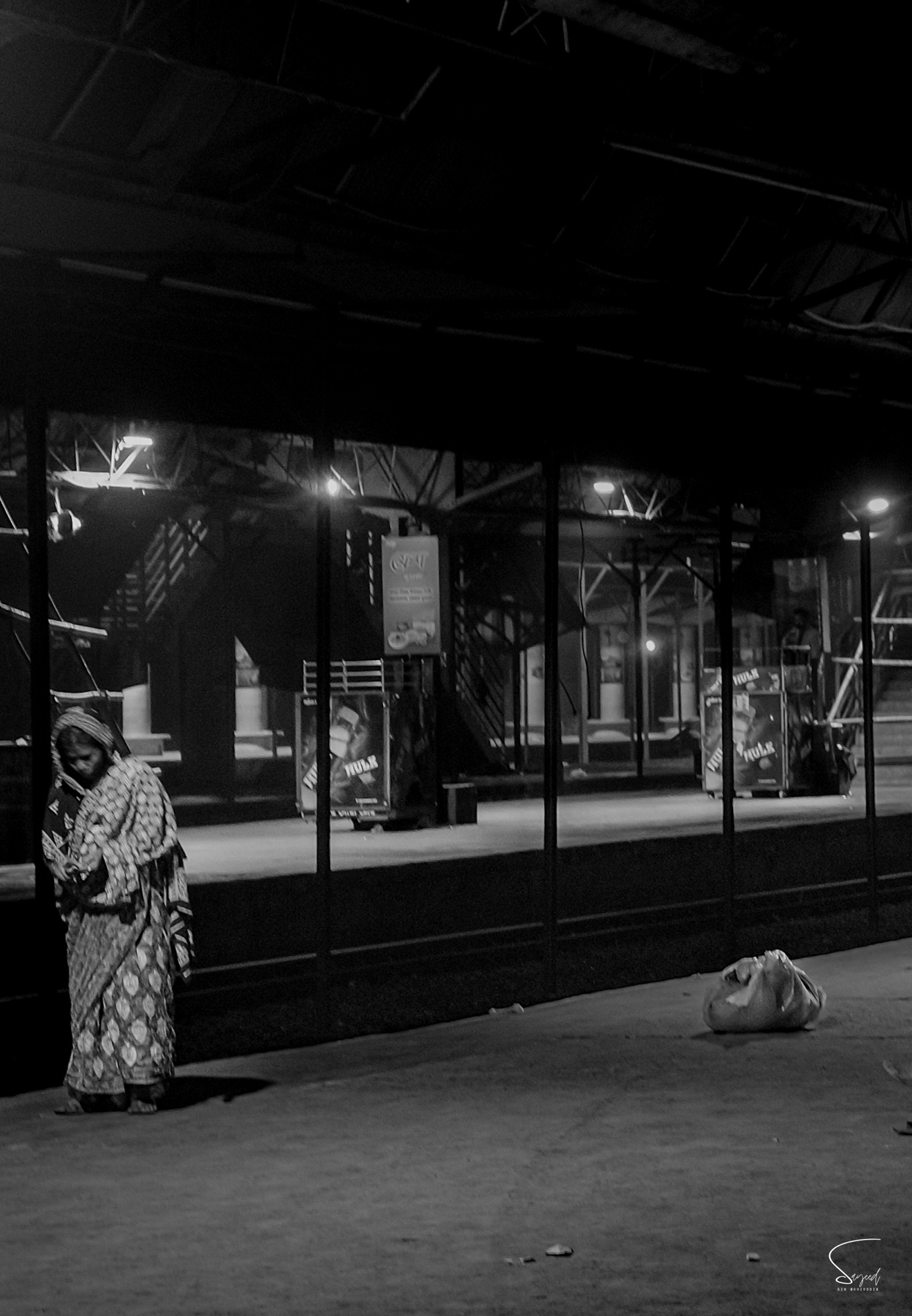 Black and white street frame from Jatrabari, Dhaka, 2025