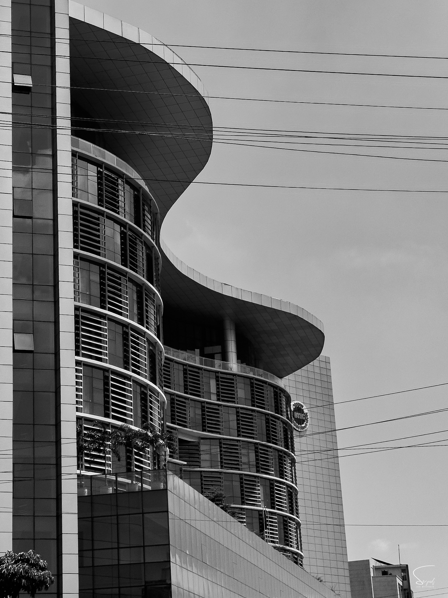 Modern curved building facade, Dhaka, architectural photography