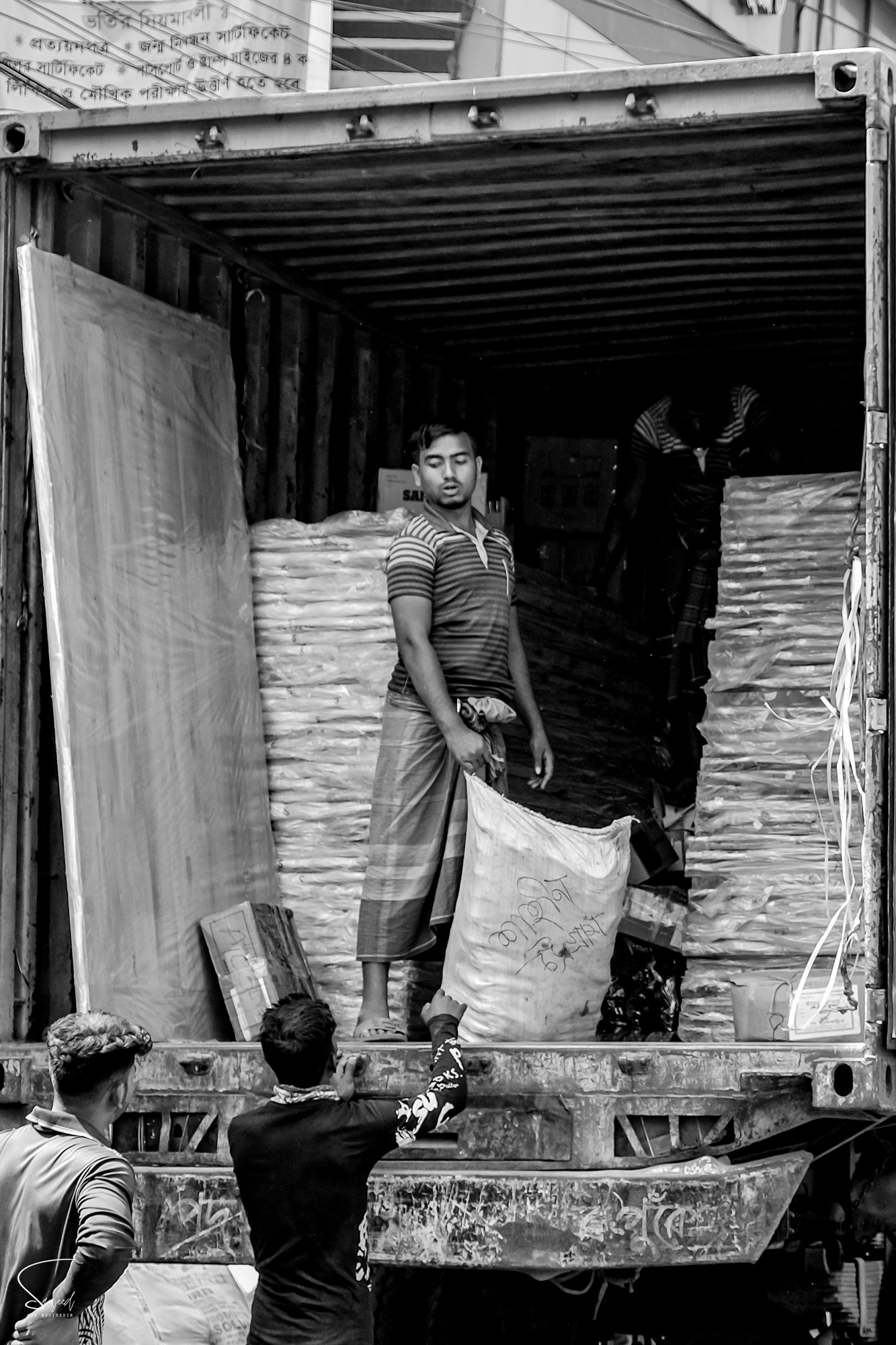 Black and white street frame from Keraniganj, Dhaka, 2024