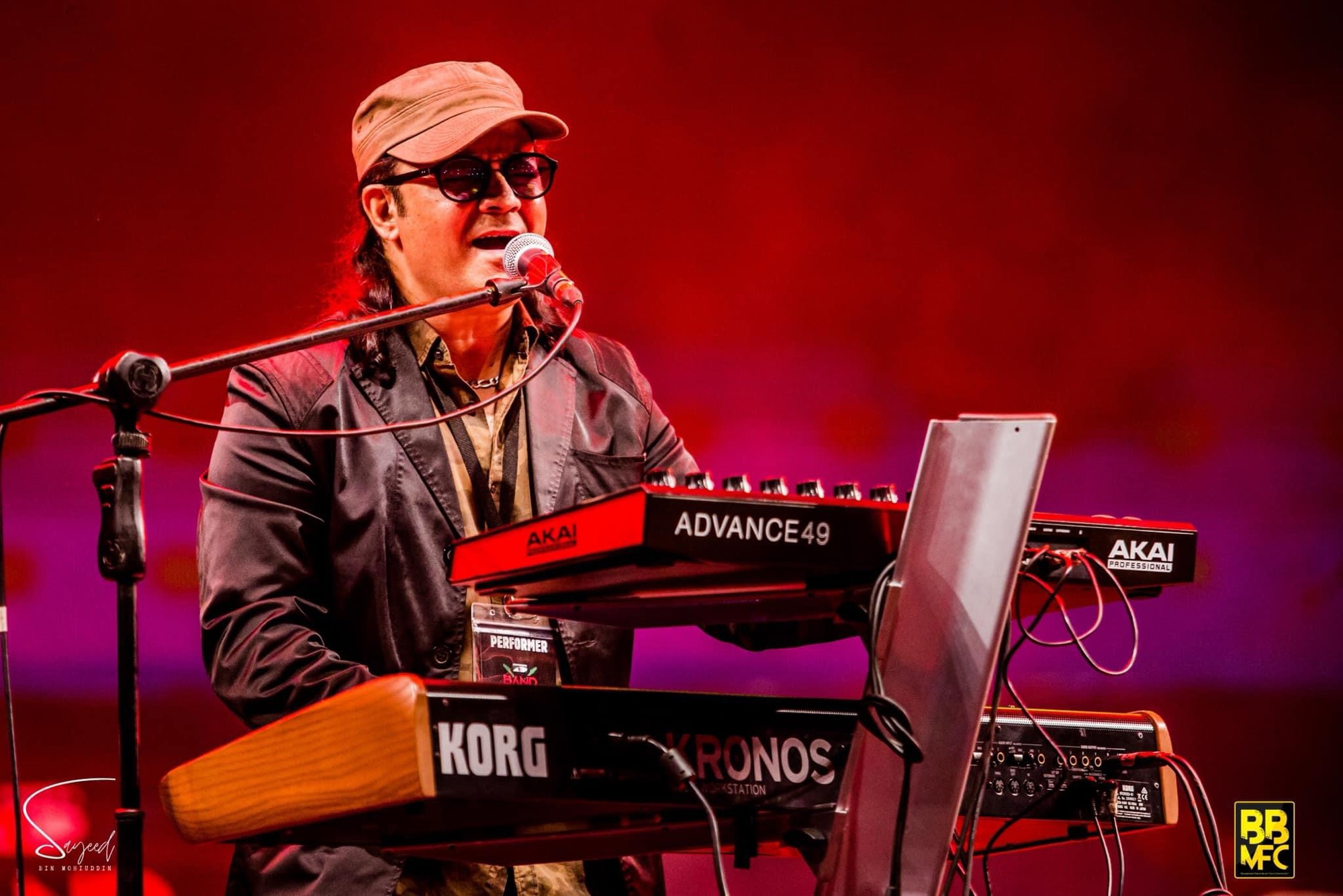 Concert performer on stage at a Bangla rock show in Dhaka — Sayeed BM