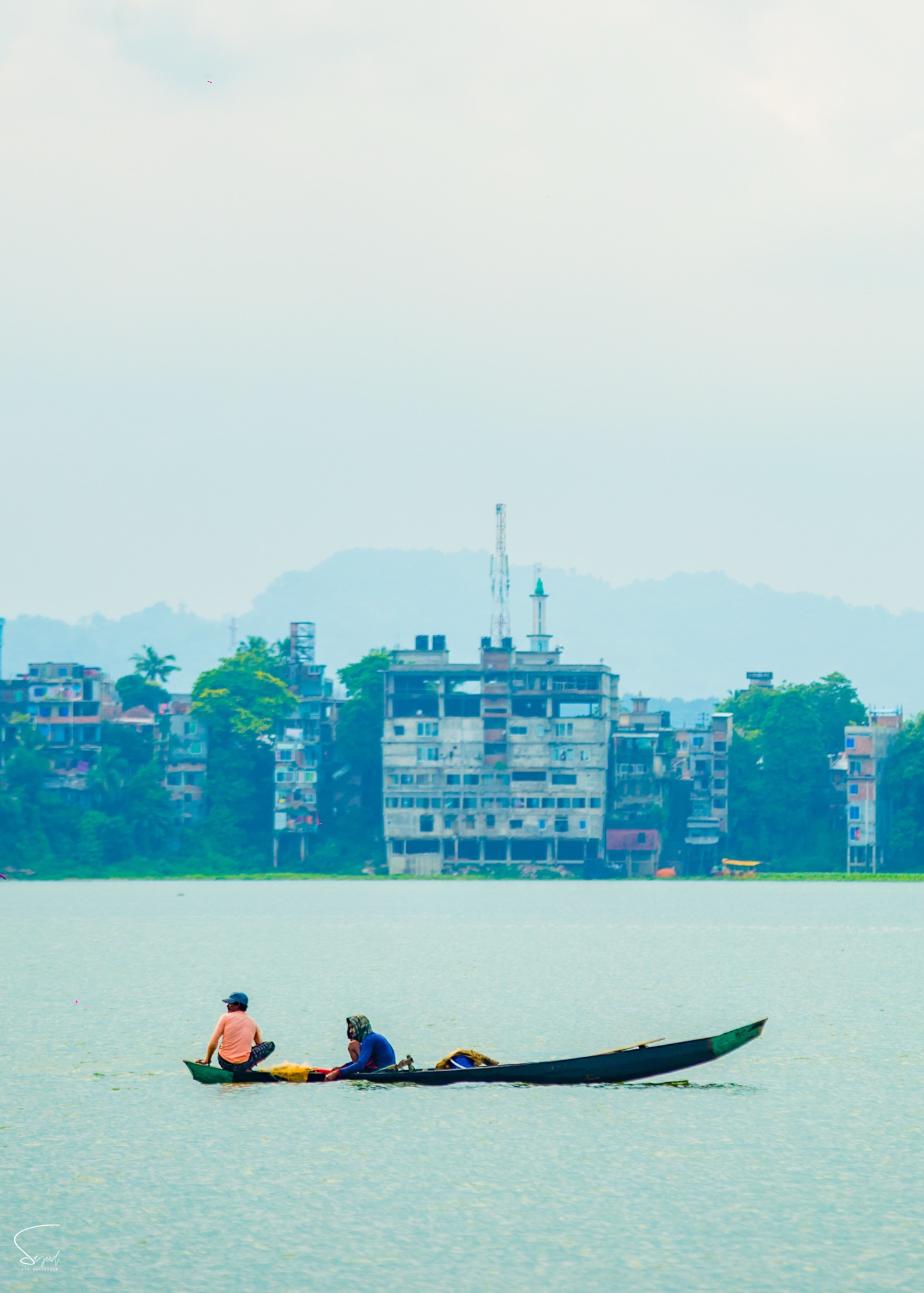 Daily life of the fishermen on a rainy day, Rangamati